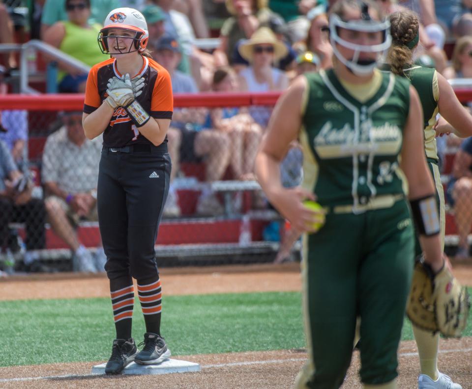 Illini Bluffs' Hannah Thomas gets excited over her RBI triple against St. Bede Illini during the Class 1A softball state title game Saturday, June 3, 2023 at the Louisville Slugger Sports Complex in Peoria. The defending champion Tigers fell to the Lady Bruins 7-6.