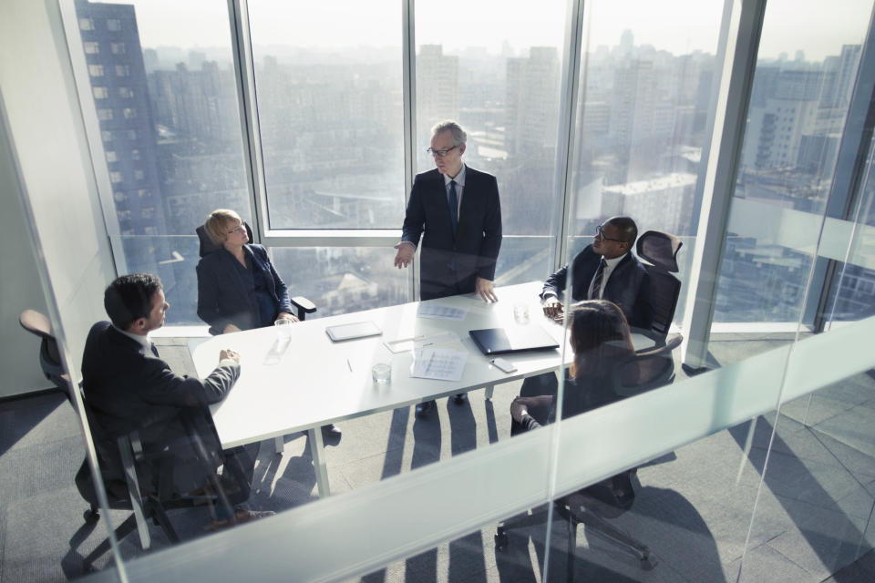 People around a table in an office