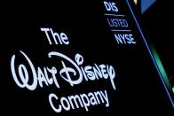 FILE PHOTO: A screen shows the trading info for The Walt Disney Company company on the floor of the NYSE in New York