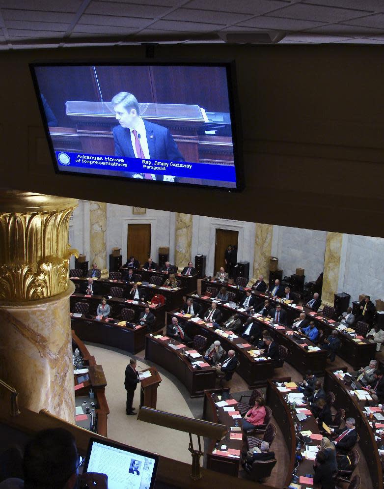 In this March 6, 2017, photo, Arkansas state Rep. Jimmy Gazaway, of Paragould, speaks in the House chamber at the state Capitol in Little Rock for his bill that would prohibit the general release of videotape depicting the death of a law enforcement officer in the line of duty. A recording of a Trumann officer being shot dead in 2011 continues to pop up in social media feeds of the officer's family nearly six years later. The state Senate could vote on the measure as early as Thursday afternoon, March 9, 2017. Gazaway helped prosecute the officer's killer. (AP Photo/Kelly P. Kissel)