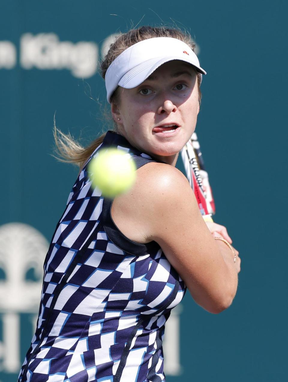 Elina Svitolina, of Ukraine, returns against Sloane Stephens during the Family Circle Cup tennis tournament in Charleston, S.C., Wednesday, April 2, 2014. Svitolina defeated Stephens 6-4, 6-4. (AP Photo/Mic Smith)