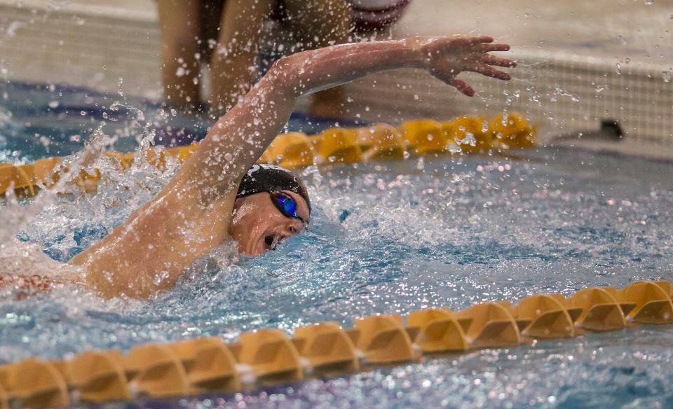 James Mauk, lead coach of Wilmington Aquatic Club's elite athletes, competing for Concord High in 2014.