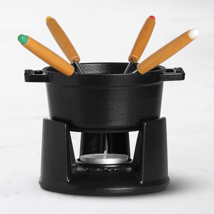 <p><a href="https://go.redirectingat.com?id=74968X1596630&url=https%3A%2F%2Fwww.williams-sonoma.com%2Fproducts%2Fstaub-fondue-set-mp&sref=https%3A%2F%2Fwww.menshealth.com%2Ftechnology-gear%2Fg35796470%2Fmothers-day-gifts-wives%2F" rel="nofollow noopener" target="_blank" data-ylk="slk:Shop Now;elm:context_link;itc:0;sec:content-canvas" class="link rapid-noclick-resp">Shop Now</a></p><p>Mini Chocolate Fondue Set, 1/4-Qt.</p><p>williams-sonoma.com</p><p>$135.00</p>