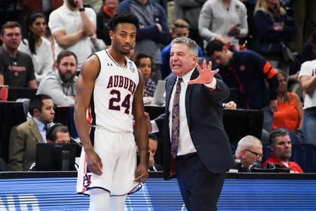 Mar 21, 2019; Salt Lake City, UT, USA; Auburn Tigers forward Anfernee McLemore (24) listens as head coach Bruce Pearl speaks during the second half in the first round of the 2019 NCAA Tournament against the New Mexico State Aggies at Vivint Smart Home Arena. Mandatory Credit: Kirby Lee-USA TODAY Sports