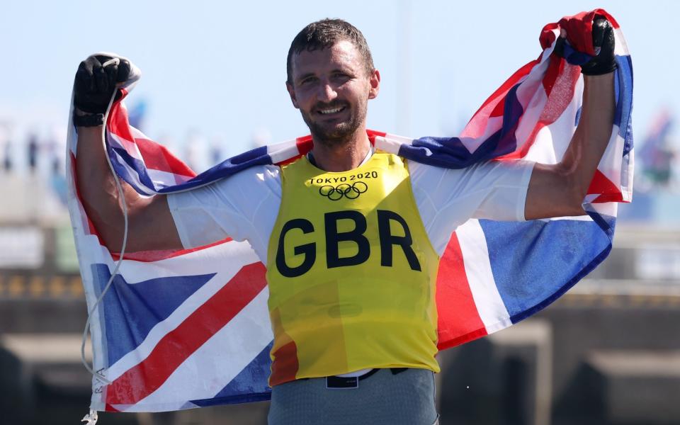 Scott secured a memorable win to claim Britain's sixth consecutive gold in the in the FInn class - GETTY IMAGES