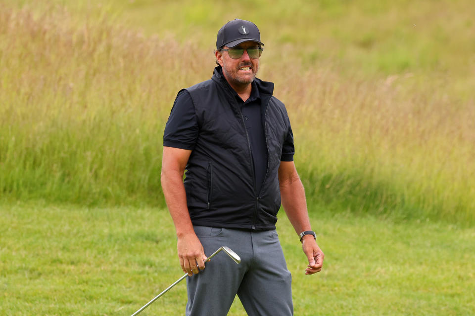 ST ALBANS, ENGLAND - JUNE 09: Phil Mickelson of Hy Flyers GC putts on the 5th green during day one of the LIV Golf Invitational - London at The Centurion Club on June 09, 2022 in St Albans, England. (Photo by Chris Trotman/LIV Golf/Getty Images)