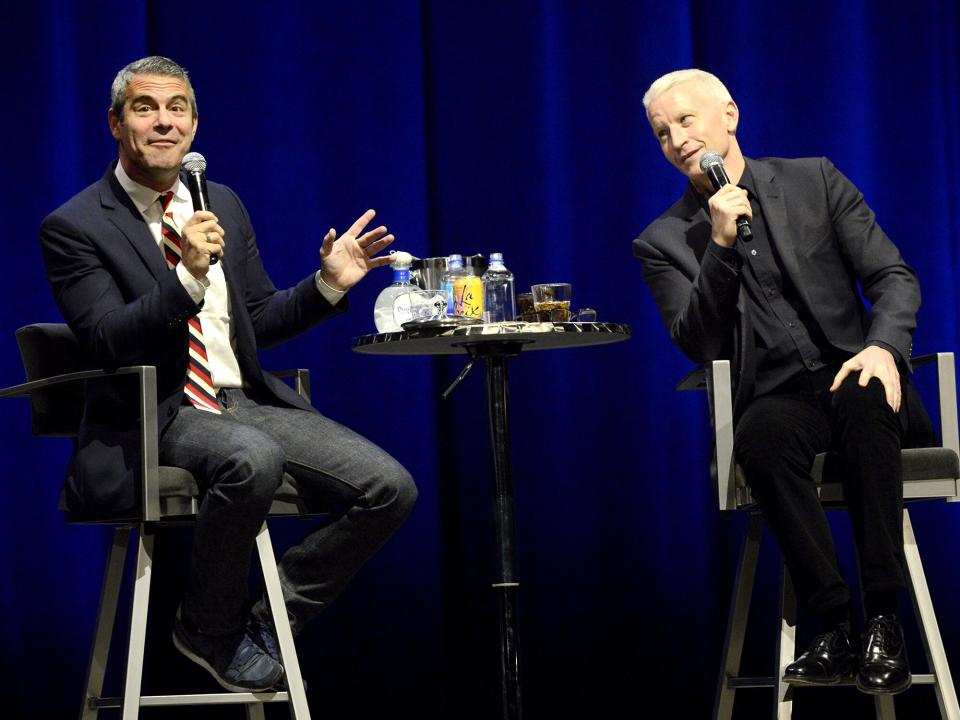 Andy Cohen (L) and Anderson Cooper perform during their AC2 tour at The Masonic on January 15, 2016 in San Francisco, California