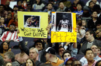 WASHINGTON, DC - FEBRUARY 08: Fans of Jeremy Lin #17 of the New York Knicks hold up signs during the second half of the Knicks and Washington Wizards game at Verizon Center on February 8, 2012 in Washington, DC. (Photo by Rob Carr/Getty Images)