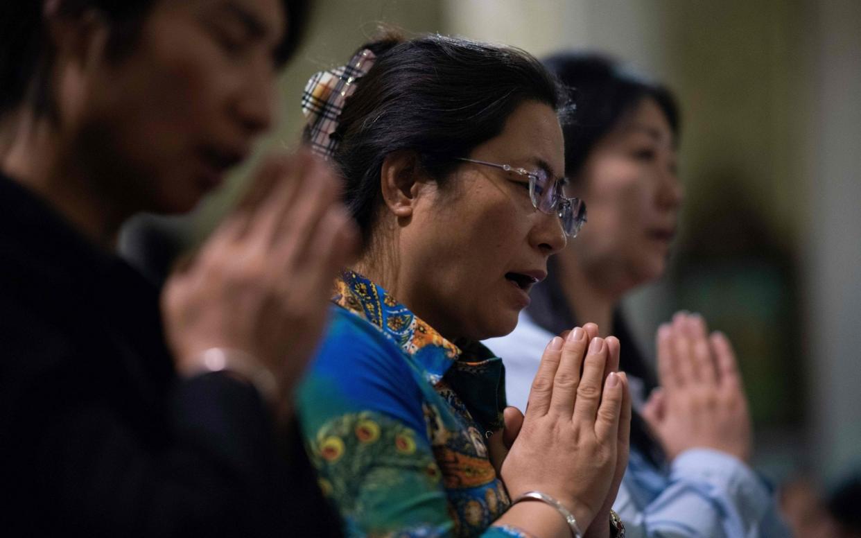 Christianity has become an increasing target for the Chinese authorities - AFP