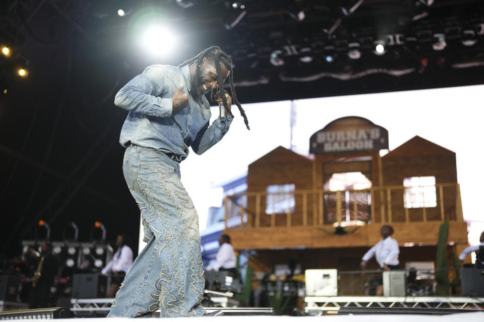 Burna Boy performs during the Glastonbury Festival in Worthy Farm, Somerset, England, Sunday, June 30, 2024. (Scott A Garfitt/Invision/AP)