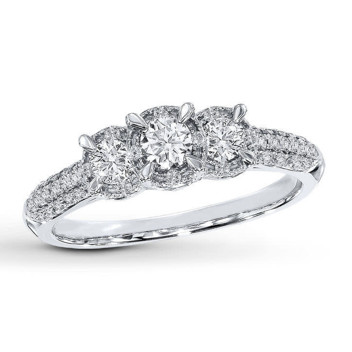 There are <a href="http://www.glamour.com/weddings/2015/06/affordable-engagement-rings-under-1000" target="_blank">plenty of diamond rings you can get</a> for under a grand, such as this one from Kay ($999, <a href="http://www.kay.com/en/kaystore/diamond-ring-1-2-ct-tw-round-cut-10k-white-gold-991077203--1?utm_campaign=CJ&amp;utm_source=rewardStyle&amp;cm_mmc=CJ-_-Affiliate-_-rewardStyle-_-Kay+Jewelers+Product+Catalog&amp;cjReq=FGSK" target="_blank">Kay</a>) with three diamonds and two rows of round diamonds down the side.&nbsp;