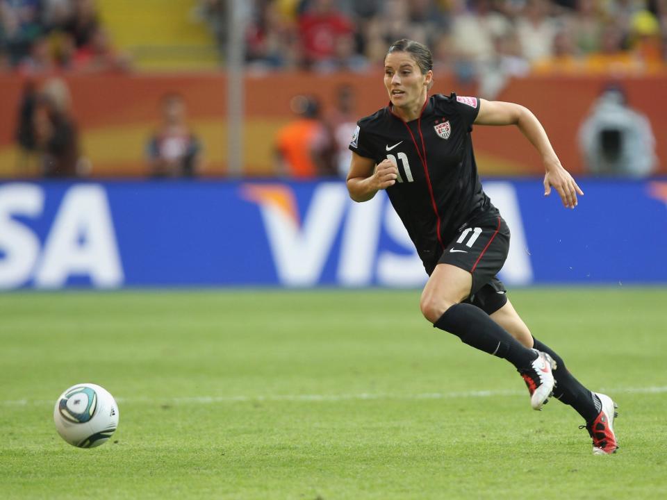 Ali Krieger dribbles upfield during the 2011 FIFA World Cup.