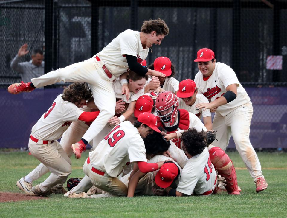 Roy C. Ketcham players celebrate their win against Elmira High School in the boys baseball Class AA Regional Final game at John Jay High School in Cross River, June 3, 2023. Ketcham beat Elmira, 12-1 in 5 innings.