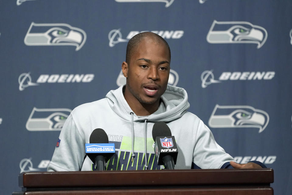 Seattle Seahawks wide receiver Tyler Lockett talks to reporters, Wednesday, Sept. 22, 2021, in Renton, Wash. The Seahawks are scheduled to play the Minnesota Vikings on Sunday in an NFL football game. (AP Photo/Ted S. Warren)