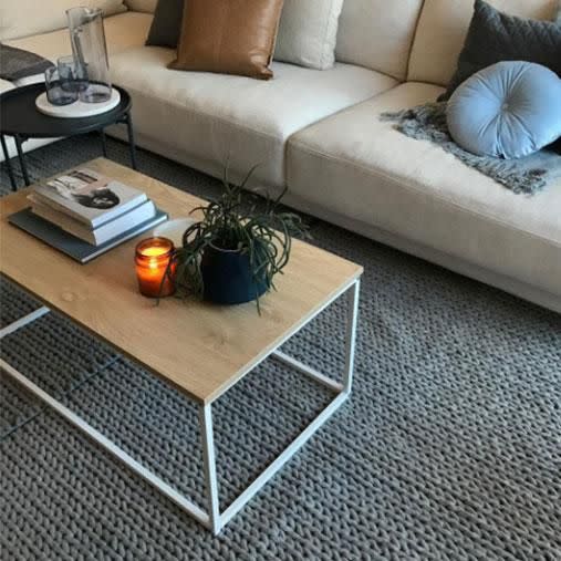 You'll get change from $50 with this Kmart grey knit rug. Photo: Instagram/kmart_bargains