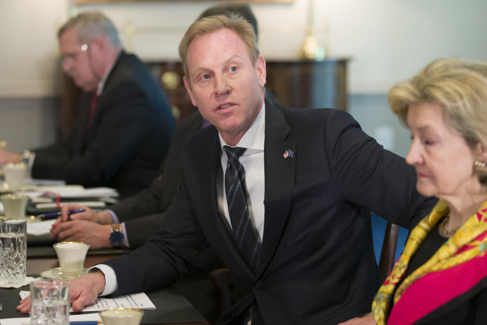 Acting Defense Secretary Patrick Shanahan, second from right, answers a question from the media during a meeting with NATO Secretary General Jens Stoltenberg at the Pentagon, Monday, Jan. 28, 2019, in Washington. (AP Photo/Alex Brandon)