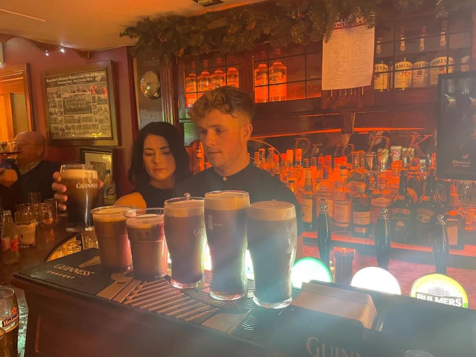 Lining up the pints at the unofficial wake at Philly’s bar (Barney Davis)