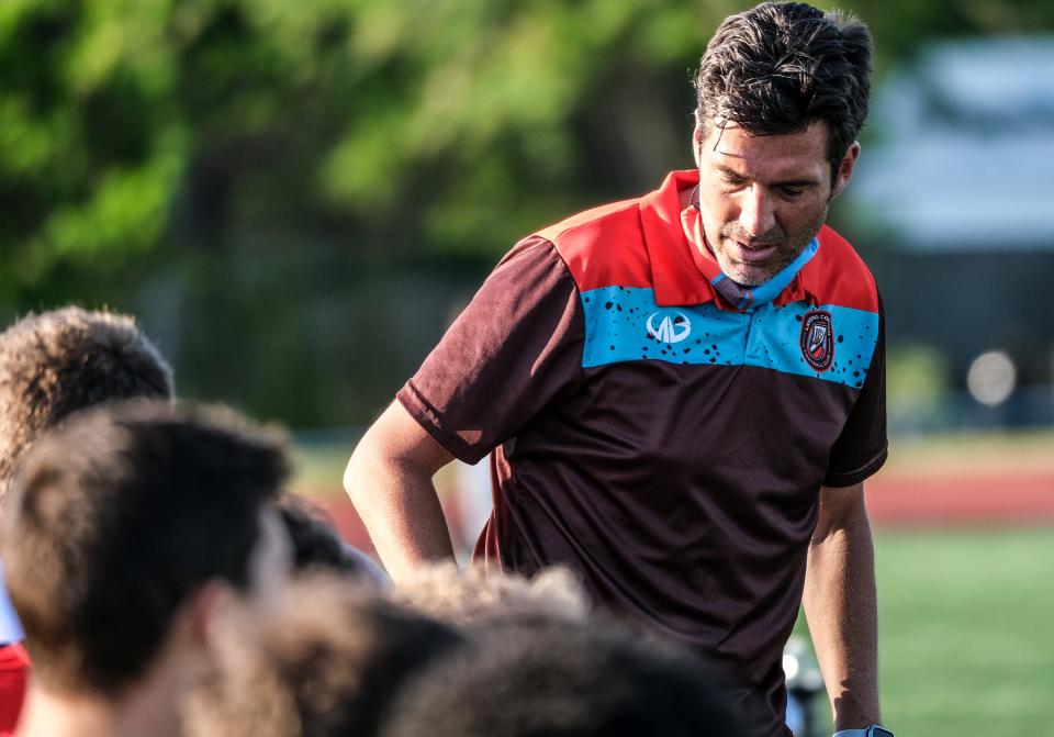 Lansing Common coach Josh Oakley, shown here talking to his team during a game in the 2021 season, is departing the club after being hired as the Eastern Illinois University men's soccer coach.