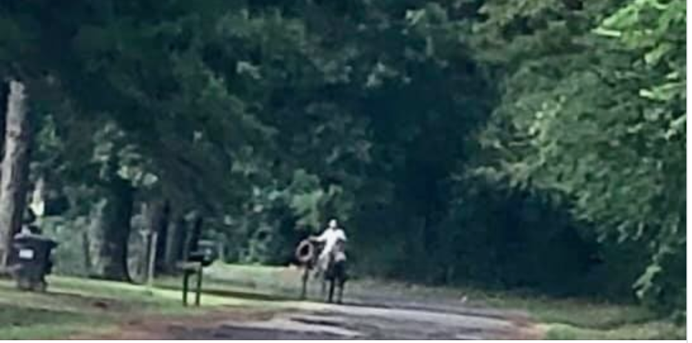 A black man was threatened by a man on horseback carrying a rope in a Texas neighborhood. (Credit: James Ragland/Facebook)