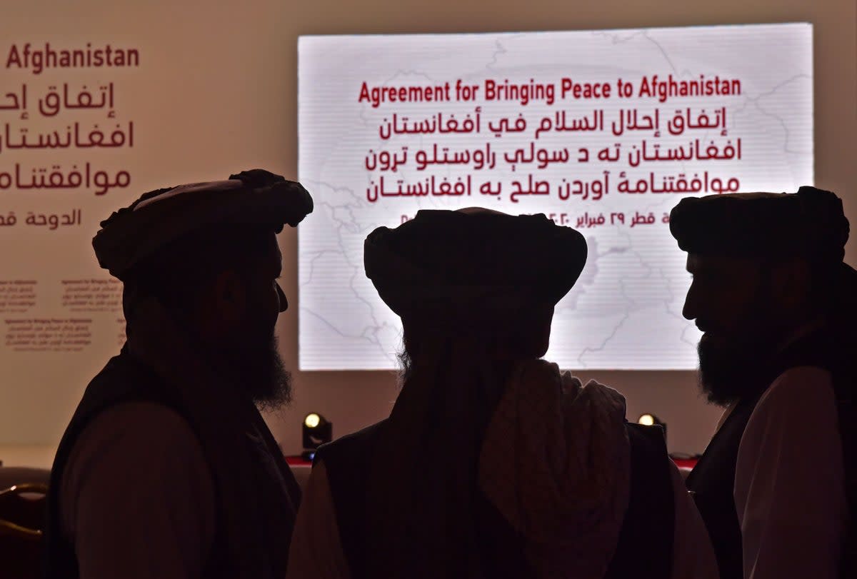 File: Members of the Taliban delegation gather ahead of the signing ceremony with the United States in the Qatari capital Doha in 2020  (AFP via Getty Images)