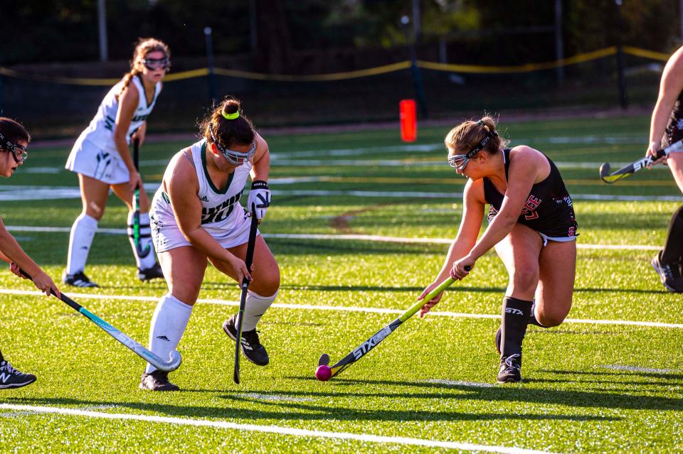 Durfee's Paitynn Botelho pokes the ball away from Dartmouth's Grace Haskell.