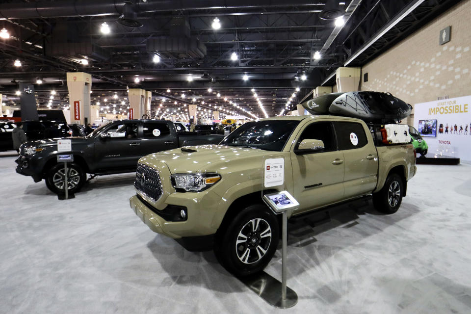 FILE- This Feb. 1, 2019, file photo shows a Toyota Tacoma at the Philadelphia Auto Show in Philadelphia. Its wide variety of configurations and well-rounded design make it a popular choice with truck shoppers. (AP Photo/Matt Slocum, File)