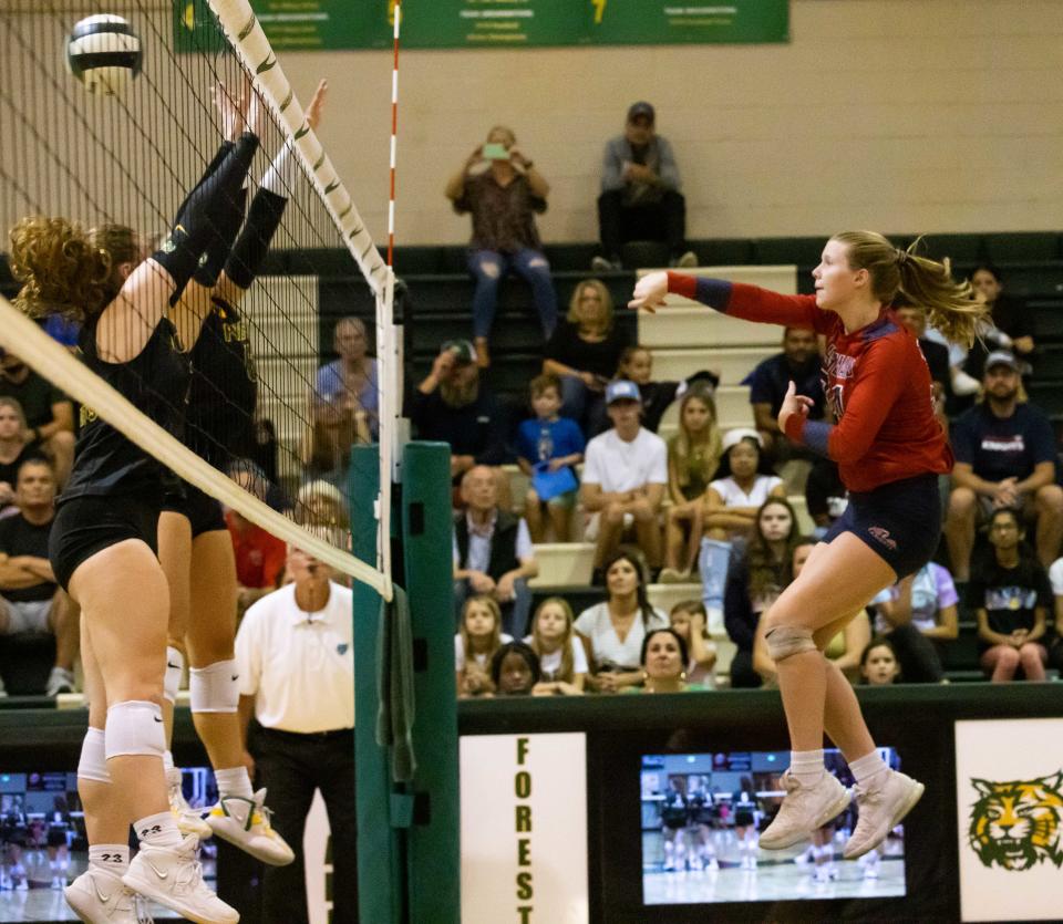 Vanguard Knights' Ruby Owen (34) spikes one over the net in the second set during their volleyball match at Forest High School in Ocala , Fla., on Thursday, Sept. 22, 2022.