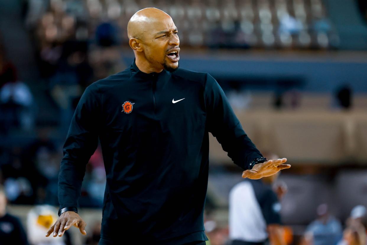 Douglass head coach Steven Alexander Jr. yells to players during the championship of the boys state basketball tournament between Douglass and Weatherford at the Jim Norick Arena in Oklahoma City, on Saturday, March 9, 2024.