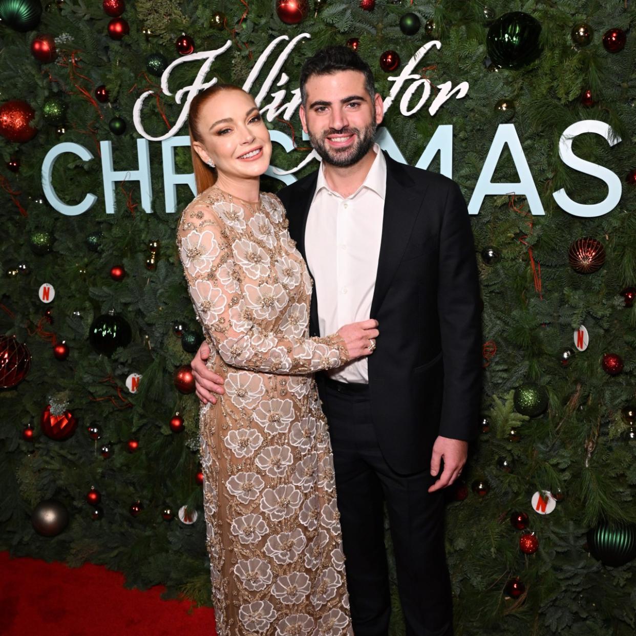  Lindsay Lohan and Bader Shammas attend Netflix’s Falling For Christmas Celebratory Holiday Fan Screening with Cast & Crew on November 9, 2022 in New York City 