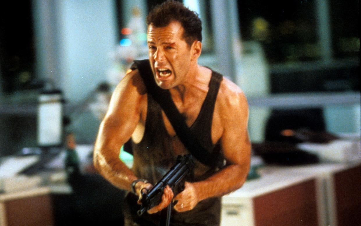Nothing says Christmas like Bruce Willis going bananas in a vest