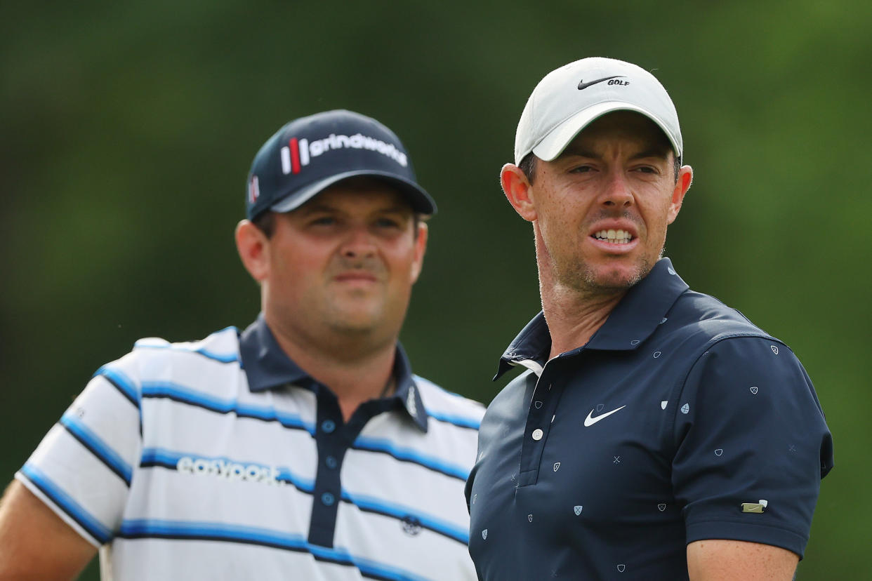 Patrick Reed (left) and Rory McIlroy, seen here in an earlier tournament, aren't exactly close these days. (Michael Reaves/Getty Images)