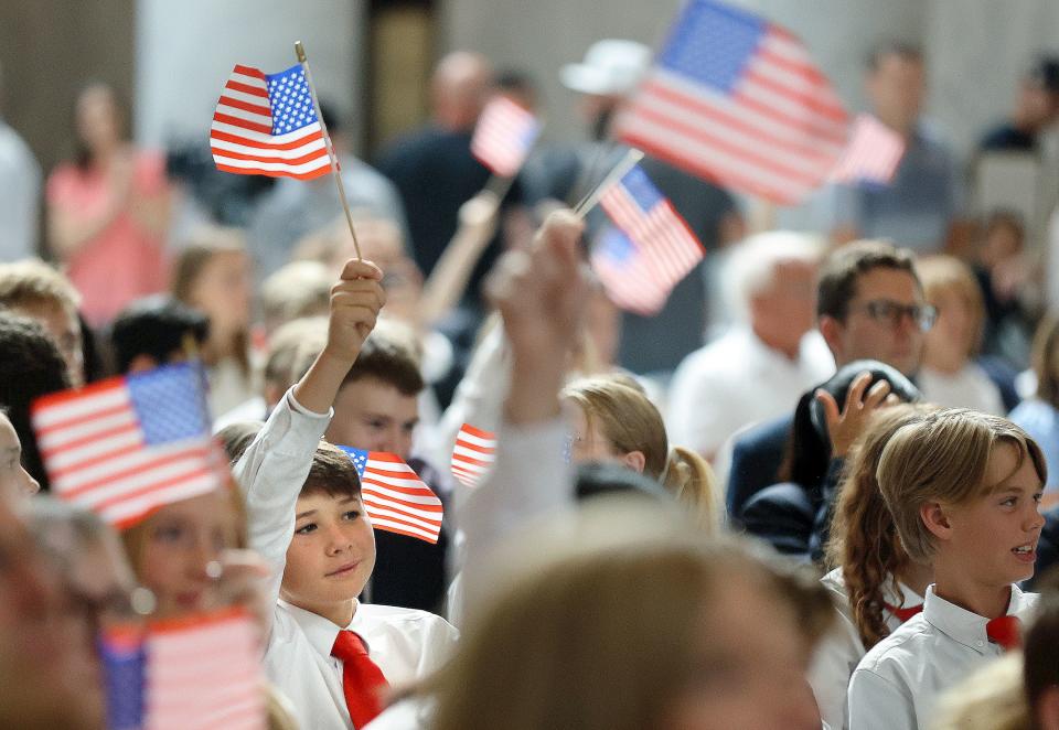 Bennett Anderson waves an American flag during the Constitution Month kickoff event at the Capitol in Salt Lake City on Thursday, Aug. 31, 2023. | Kristin Murphy, Deseret News