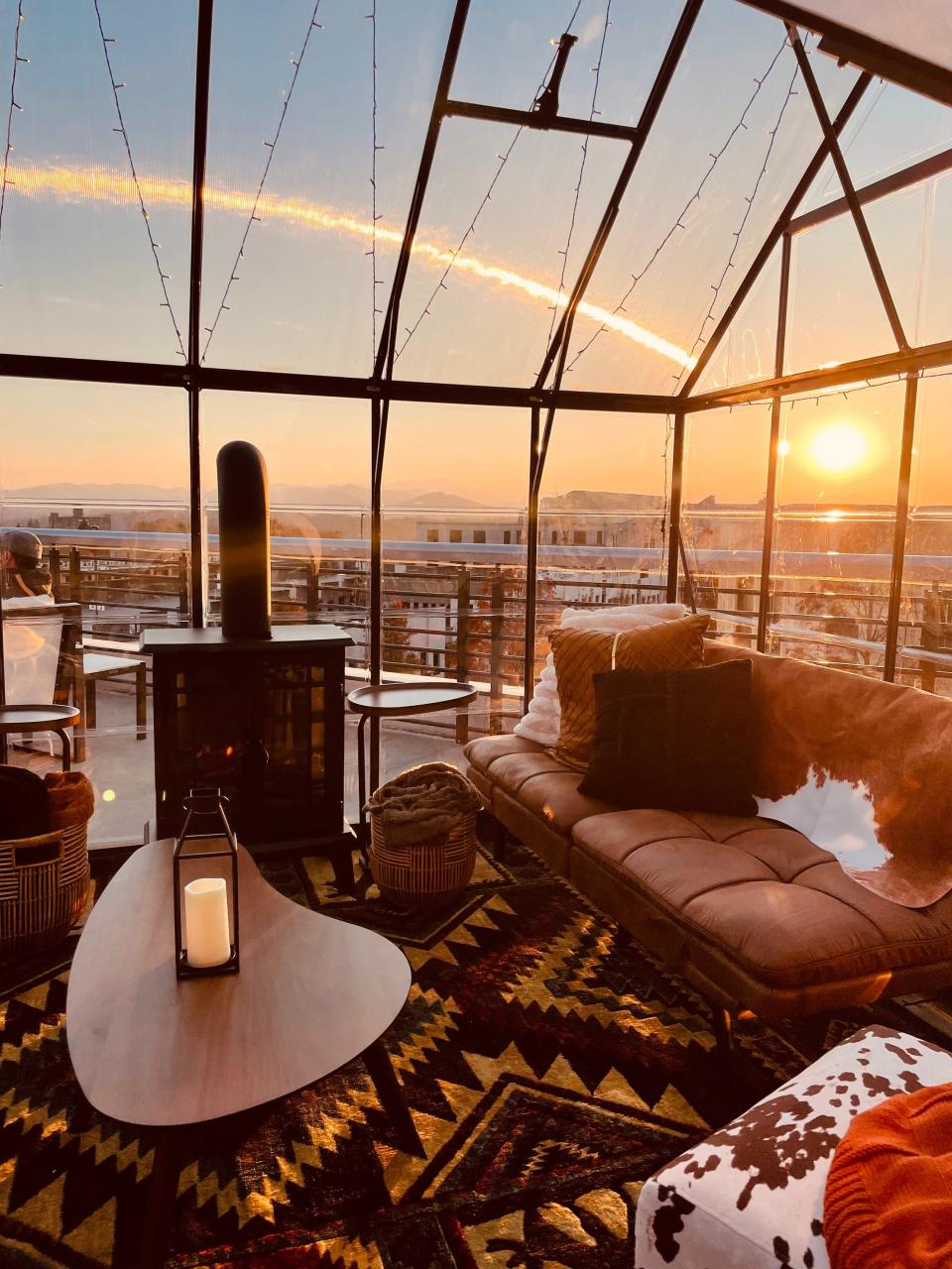 Hemingway's Cuba, a Cuban restaurant on the 4th floor of Cambria Downtown Asheville, has added winter cabanas made from greenhouses that offer warmth and views of the city through the winter season.