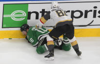 Dallas Stars' Joe Pavelski (16) is checked by Vegas Golden Knights' Jonathan Marchessault (81) during the second period of Game 4 of the NHL hockey Western Conference final, Saturday, Sept. 12, 2020, in Edmonton, Alberta. (Jason Franson/The Canadian Press via AP)