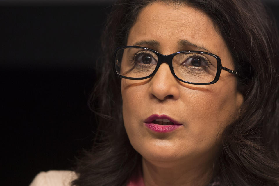 Nawal El Moutawakel, head of the International Olympic Committee, IOC, Evaluation Commission answers a question during a press conference in Rio de Janeiro, Brazil, Friday, March 21, 2014. IOC officials are in Rio to monitor progress on the preparations for the 2016 Olympics. The city's mayor acknowledged that work on a large cluster of venues is far behind schedule. (AP Photo/Felipe Dana)