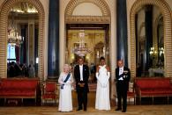 <p>Queen Elizabeth, President Barack Obama, First Lady Michelle Obama, and Prince Philip chat in the Music Room before a banquet.</p>