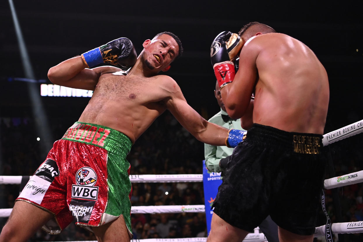 GLENDALE, ARIZONA - MAY 21: David Benavidez (R) throws a left at David Lemieux during their WBC Super Middleweight Interim Title fight at Gila River Arena on May 21, 2022 in Glendale, Arizona. (Photo by Kelsey Grant/Getty Images)