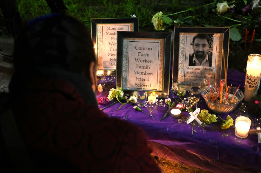 A makeshift memorial is pictured during a candlelight vigil for the shootings victims at Monterey Park, Half Moon Bay and East Oakland in Oakland, California on January 25, 2023. (Photo by Samantha Laurey / AFP) (Photo by SAMANTHA LAUREY/AFP via Getty Images)