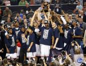 Apr 7, 2014; Arlington, TX, USA; The Connecticut Huskies celebrate winning the championship game of the Final Four in the 2014 NCAA Mens Division I Championship tournament over the Kentucky Wildcats at AT&T Stadium. Kevin Jairaj-USA TODAY Sports