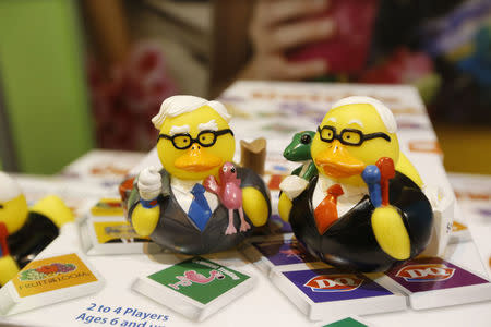 Commemorative items for sale are on display at the Oriental Trading Company booth. REUTERS/Ryan Henriksen