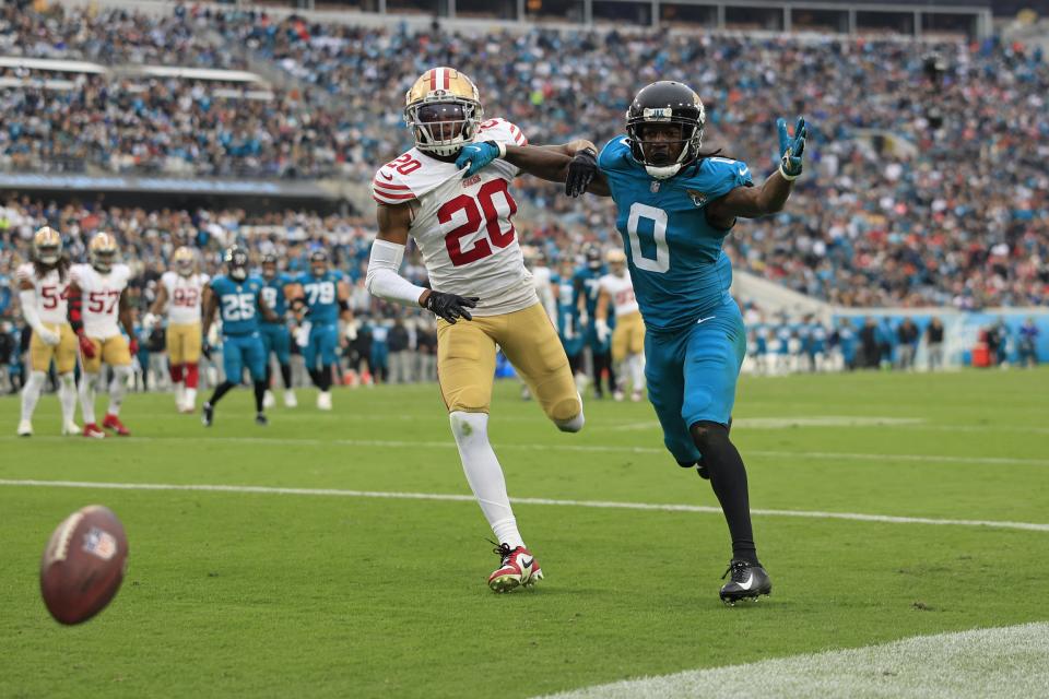 Jacksonville Jaguars wide receiver Calvin Ridley (0) can’t haul in a reception as San Francisco 49ers cornerback Ambry Thomas (20) pressures during the third quarter of an NFL football game Sunday, Nov. 12, 2023 at EverBank Stadium in Jacksonville, Fla. The San Francisco 49ers defeated the Jacksonville Jaguars 34-3. [Corey Perrine/Florida Times-Union]