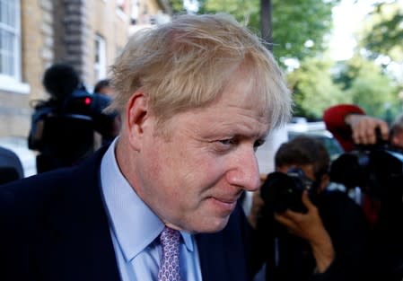 PM hopeful Boris Johnson leaves his home in London