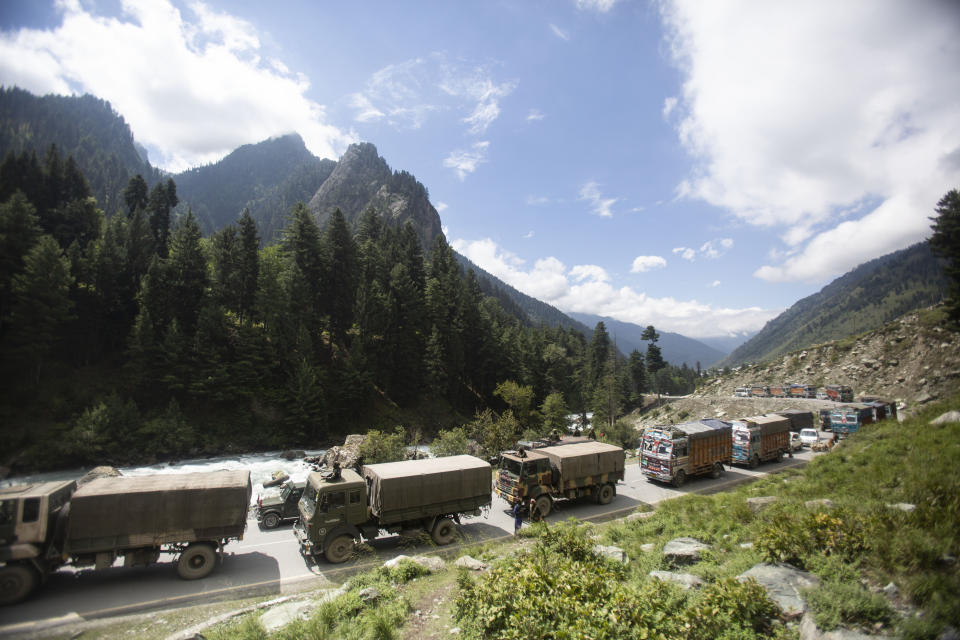 An Indian army convoy moves on the Srinagar- Ladakh highway at Gagangeer, northeast of Srinagar, Indian-controlled Kashmir, Tuesday, Sept. 1, 2020. India said Monday its soldiers thwarted “provocative” movements by China’s military near a disputed border in the Ladakh region months into the rival nations’ deadliest standoff in decades. China's military said it was taking “necessary actions in response," without giving details. (AP Photo/Mukhtar Khan)