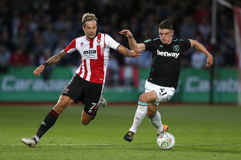 West Ham United's Declan Rice and Cheltenham Town's Harry Pell