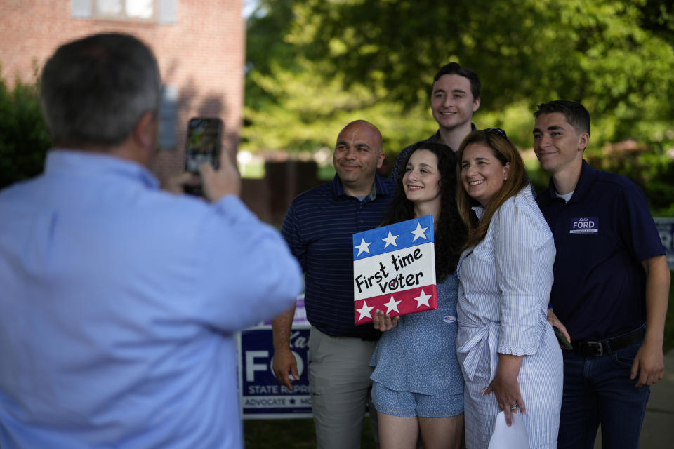 Katie Ford, second from right, Republican candidate for Pennsylvania House of Representatives, poses for a photograph with her family after voting at her polling place at Drexelbrook Apartments, Tuesday, May 16, 2023, in Drexel Hill, Pa. (AP Photo/Matt Slocum)