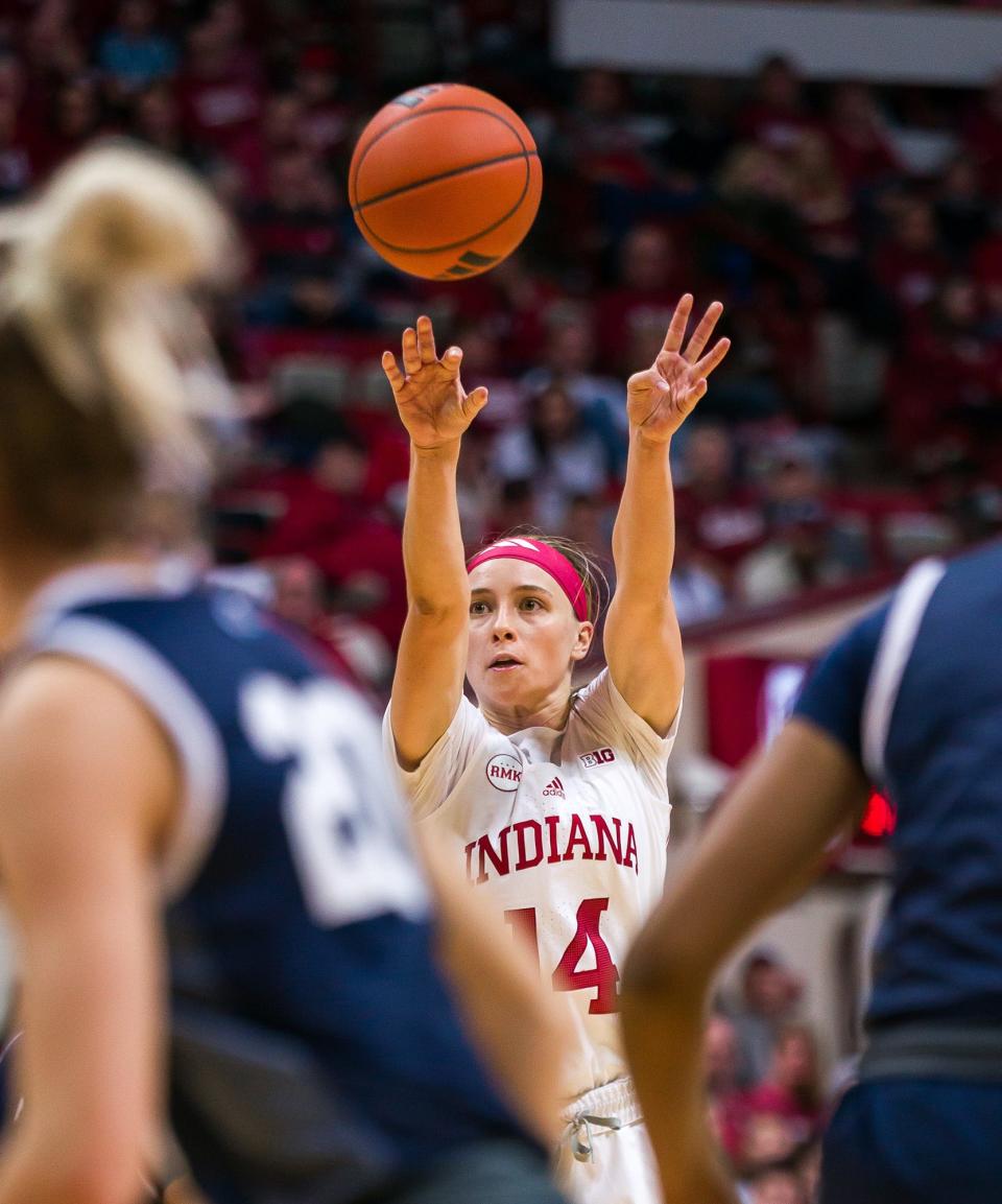 Indiana Hoosier guard Sara Scalia (14) shoots a three pointer during the basketball game between the Penn St. Lady Lions and Indiana Hoosiers at Simon Skjodt Assembly Hall in Bloomington, IN.