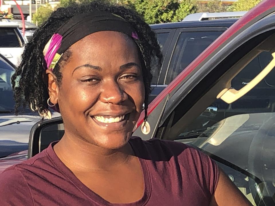 This Sunday, Aug. 30, 2020 photo shows Brittaney Leake, 27, of Green Bay, Wis. Leake says she didn't vote in 2016 because she's disillusioned with what she see as politicians' unfulfilled promises. Biden hasn't given her a reason to change course, she said. “Just because he's a Democrat doesn't mean he has my vote,” Leake said. “If I can't specific see what he's going to do for a change, I'm not going to vote for him. ... There has to be action.” (AP Photo/Kathleen Hennessey)
