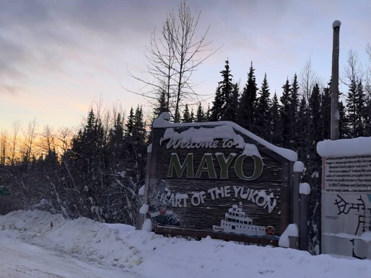 A sign welcomes people to Mayo, Yukon, in January. (Virginie Ann/CBC News - image credit)