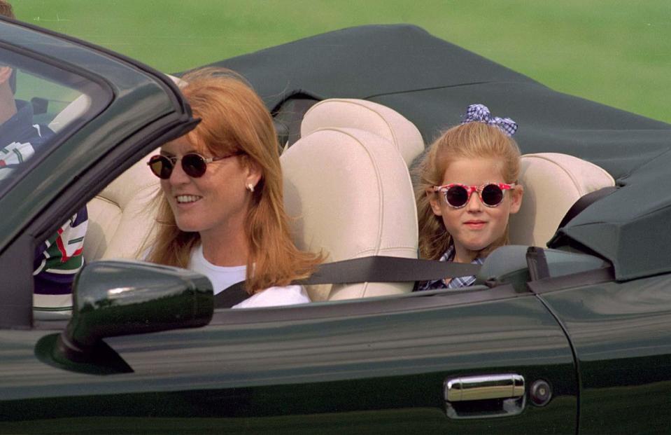 <p>A young Princess Beatrice looks stylish, as she rides around London in her mother, Sarah Ferguson's, convertible in 1996. Shout out to those chic sunglasses. </p>