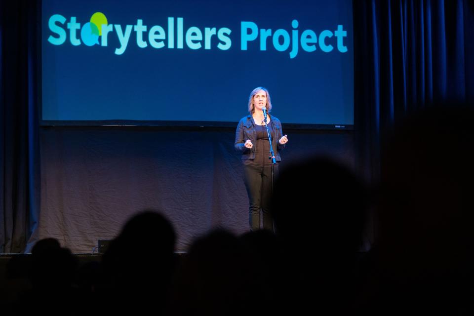 Stevie Lang tells her story during the Des Moines Storytellers Project's "Generosity" show at Hoyt Sherman Place in Des Moines on Tuesday, Dec. 13, 2022.